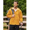 imageCOOFANDY Mens Packable Rain Jacket Lightweight Waterproof Raincoat with Hood Outdoor Rain Gear Travel Hiking CyclingOrange Yellow