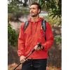 imageCOOFANDY Mens Packable Rain Jacket Lightweight Waterproof Raincoat with Hood Outdoor Rain Gear Travel Hiking CyclingRed