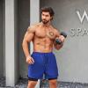 imageCOOFANDY Mens 2 Pack Running Shorts 2 in 1 Workout Shorts Quick Dry Gym Training Athletic Jogger with Phone Pockets2pack Orangeroyal Blue