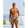 imageCOOFANDY Mens Hawaiian Beach Shorts Elastic Waist Drawstring Lightweight Summer Casual Shorts with PocketWine Redgolden Tropical Print