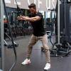 imageCOOFANDY Men Muscle Workout T Shirt Gym Bodybuilding Active Short Sleeve Tee Top BlackTwo Pack BlackBlack