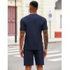 imageCOOFANDY Mens 2 Pieces Outfits Casual Quarter Zip Polo T Shirt and Shorts Set Athletic Jogging Summer TracksuitNavy Blue