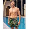 imageCOOFANDY Men Swim Trunk with Compression Liner 2 in 1 Swimwear Bathing Suit Quick Dry Board ShortZ Print Yellow Leaf