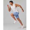 imageCOOFANDY Mens Gym Workout Shorts Quick Dry Athletic LooseFit Lightweight Running Shorts with Zipper PocketsLight Blue