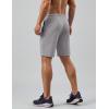 imageCOOFANDY Mens Gym Workout Shorts Quick Dry Athletic LooseFit Lightweight Running Shorts with Zipper PocketsQuiet Gray