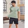imageCOOFANDY Mens Swim Shirt UPF 50 Sun Protection Rash Guard Short Sleeve Athletic Quick Dry Beach Fishing T ShirtsLight Green